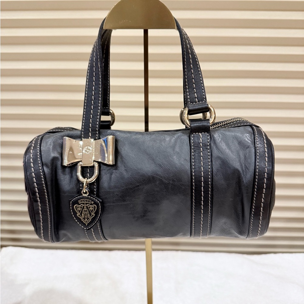 Gucci Black Mini Bag with Gold Accents